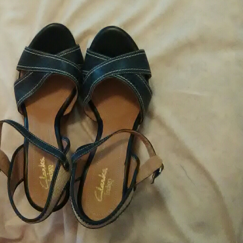 Never worn Clark's indigo sandals genuine leather